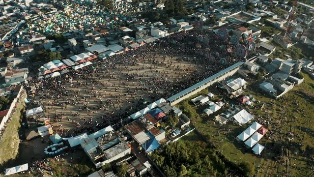 Aerial Drone View Of A Festive Event Of D&iacute;a de Los Muertos With Giant Kites In Sumpango, Guatemala. Reveal