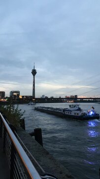River in the evening with a ship in the backround