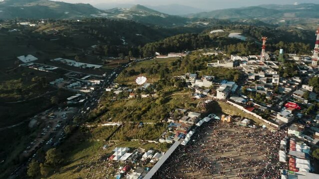 Large Barrilete Kite Flying Above Sumpango Town During D&iacute;a de Los Muertos Celebrations In Guatemala. Aerial Tracking Shot