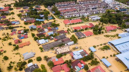 Aerial view of Dengkil district from flooding that causes damage of the infrastructure and housing area. Selective focus, contains dust and grain