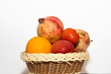 Fresh Fruits In Basket In White Background