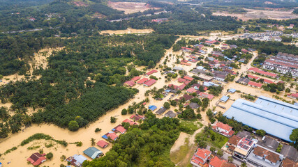 Aerial view of Dengkil district from flooding that causes damage of the infrastructure and housing area. Selective focus, contains dust and grain