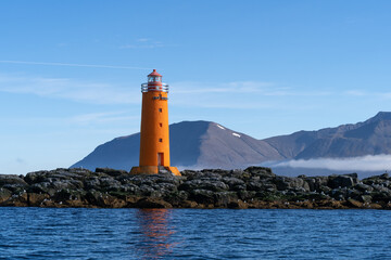 Beautiful Lighthouse in the Middle of  a Fjord
