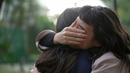Sympathetic woman hugging friend with EMPATHY and SUPPORT. Friendship concept between two best...