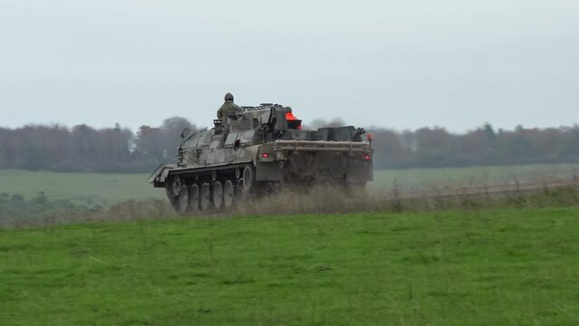 British Army Challenger Armored Repair and Recovery Vehicle (CRARRV) in action on a military battle training exercise, Wilts UK