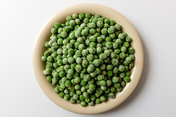 green peas on a white background