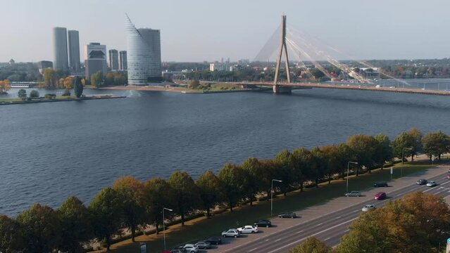 Vansu bridge in Riga with skyscrapers in background, aerial drone view