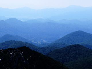 View of distant hills and mountain forests of Gorski Kotar from Risnjak National Park, Croatia...