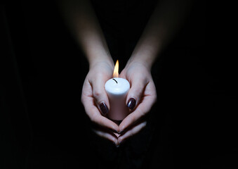 candle in hands