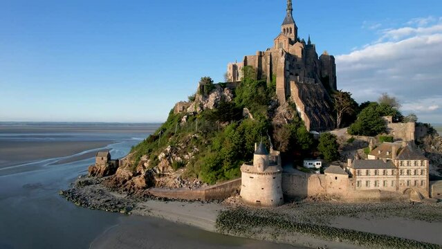 Mont Saint Michelle Normandy France, Aerial view rotating left at sunset
