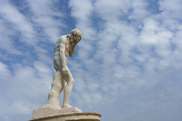 Marble sculpture of Cain after killing his brother Abel by Henri Vidal created in 1896, in...