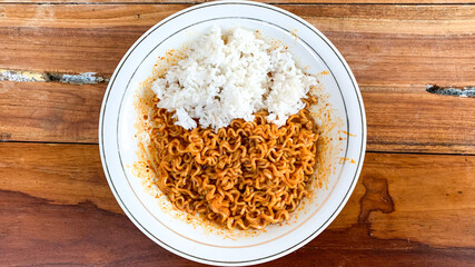 bowl of rice with instant fried noodle.