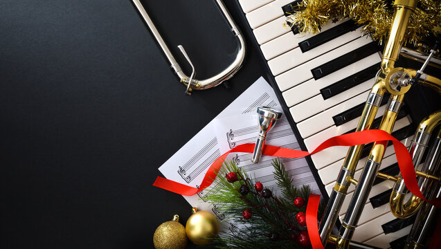Christmas music performance with piano and trombone