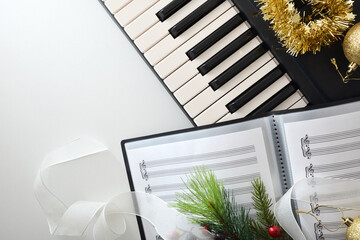 Conceptual detail of Christmas choir and piano concert on white