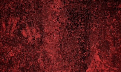 A textured background featuring deep red tones with a distressed, grunge appearance. The surface shows scratches and uneven patterns, creating a vintage feel.