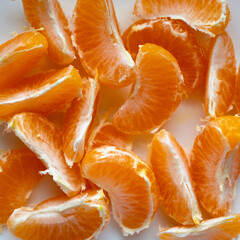 peeled tangerine on white