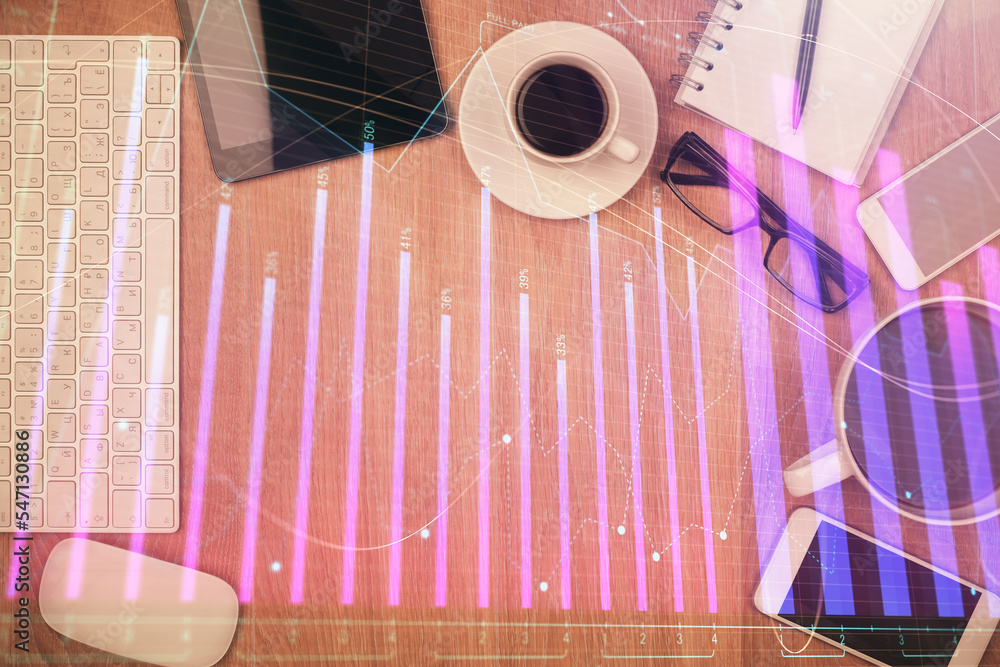 Aufkleber double exposure of financial chart hologram over desktop with phone. top view. mobile trade platform