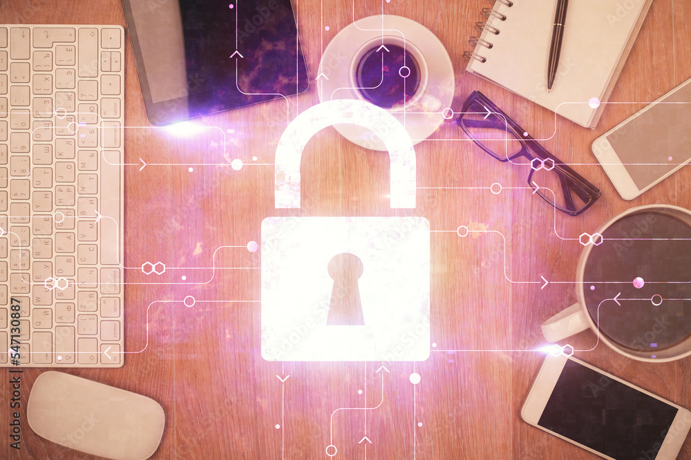 Poster double exposure of lock drawing over desktop. top view. security concept.
