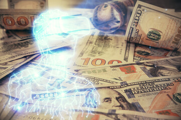 Double exposure of man wearing VR glasses drawing over usa dollars bill background. Concept of virtual reality.