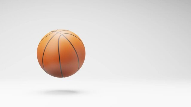 Basketball Ball Spinning on a Studio Light Gray Background, Seamless Loop 3D Animation with Copy Space