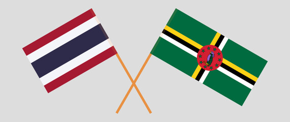 Crossed flags of Thailand and Dominica. Official colors. Correct proportion