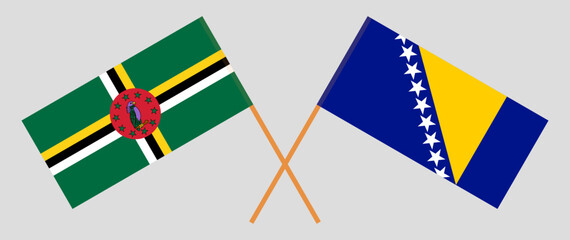 Crossed flags of Dominica and Bosnia and Herzegovina. Official colors. Correct proportion