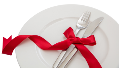 Holiday table setting close up. Cutlery and red satin ribbon decoration on white dishes, transparent background, PNG.