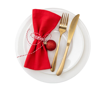 Christmas table setting, celebration dinner. Golden Cutlery and red cloth napkin isolated on transparent background, PNG,