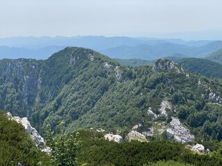 Fototapeta na wymiar The Peaks northern Small Risnjak (1,428) and southern Small Risinjak (1,446) in Risnjak National Park, Crni Lug - Croatia (Vrhovi južni i sjeverni Mali Risnjak u nacionalnom parku Risnjak - Hrvatska)