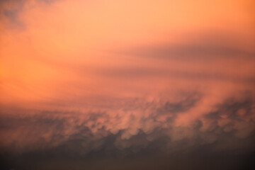 Dramatic clouds formations during a colorful sunset after a summer storm