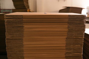 
Corrugated cardboard sheets are one by one, they are prepared for the production of cardboard boxes.