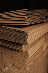 
Corrugated cardboard sheets are one by one, they are prepared for the production of cardboard boxes.