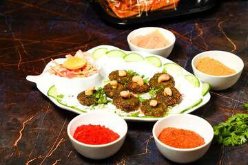 Indian Side Dish Popular Chaat Snacks Aaloo Aalu Mashed Boiled Potato Tikki With Spicy Green Chutney And Tomato Sauce 