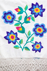 Traditional Slavic vintage vyivka. Ethnic floral Ukrainian or Belarusian pattern on fabric.