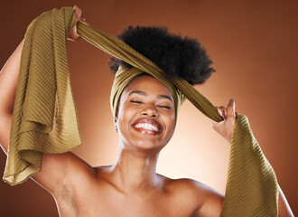 Black woman, african head wrap and hair care of a model with healthy skincare and natural beauty....
