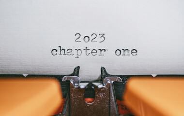 Old Typewriter with following text on paper - 2023 Chapter one. new years concept