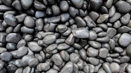 Black pebble stone stock photo