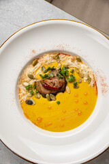 delicious soup prepared in the restaurant by the chef

