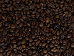 Roasted coffee beans. Background with coffee beans.