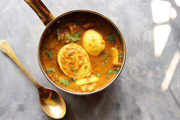 Egg Curry or Anda masala gravy, baida curry. Indian spicy food. Indian nonvegetarian Homemade food. Perfect Indian lunch. over moody background with copy space.