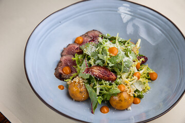 a delicious salad prepared in the restaurant by the chef
