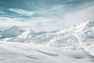 Fototapeta na wymiar Breathtaking snowy winter mountain landscape photographed at ski resort Mölltaler Gletscher.