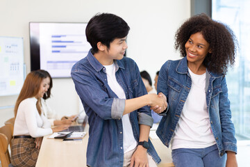 Diverse colleagues working together in a business organization. Group of young startup entrepreneurs.