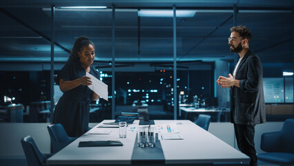 Futuristic Office Online Meeting Video Conference Call: Businesswoman and Businessman Talk using Augmented Reality Software. e-Business For Virtual Remote Work. Ultra Realistic Hologram Concept.