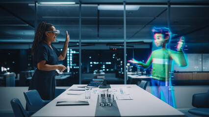 Office Online Meeting Video Conference Call: Businesswoman Wearing Virtual Reality Glasses to Talk With Digital Avatar of Colleague in Augmented Reality Metaverse. Hologram of Virtual Employee Concept