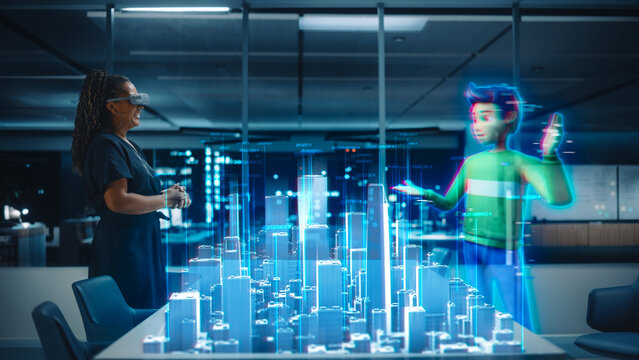 Office Online Meeting Video Conference Call: Businesswoman Connect to Augmented Reality Metaverse, Talks to Digital Avatar of Colleague With Real Estate Project Blueprint. Virtual Hologram Concept.