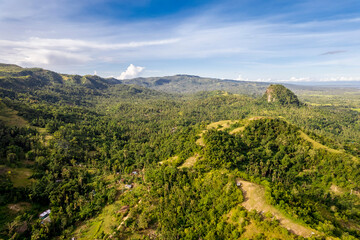 Fototapeta na wymiar Beautiful morning aerial of the Ilijan Hill and the bohol countryside in the town of Tubigon.