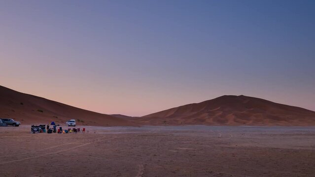 4K Time lapse sunrise of camping in desert safari