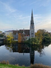reflection of St Alban's Church in the canal of the fortres