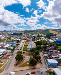 Cloudy blue sky over the Dalcahue, Chiloe cityscape with the view of the Armenian Church